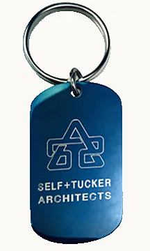 Self Tucker Architects blue stainless steel key chain